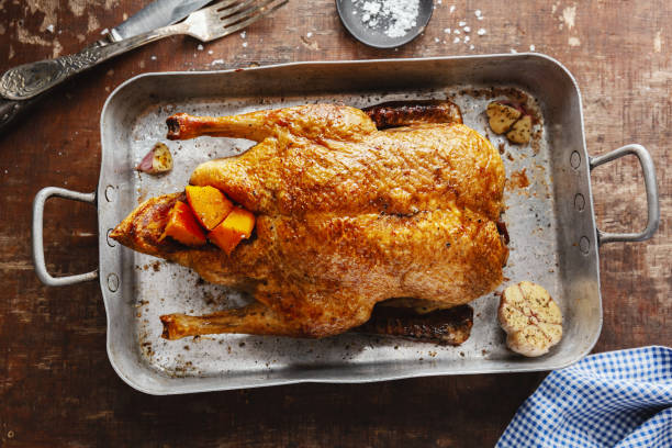 istock Roasted whole duck with vegetables 1361890245