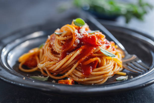 istock Pasta with spaghetti sauce and cheese 1361890286