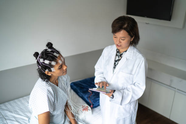 doctor or nurse talking to patient before polysomnography