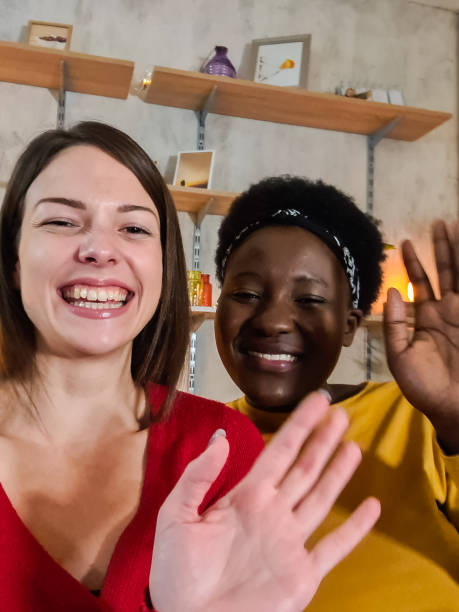 istock Female friends taking a selfie at home 1361896709