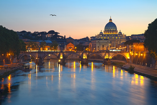 St. Peter's Basilica, Ponte Sant Angelo, Tiber river. Rome, Italy.