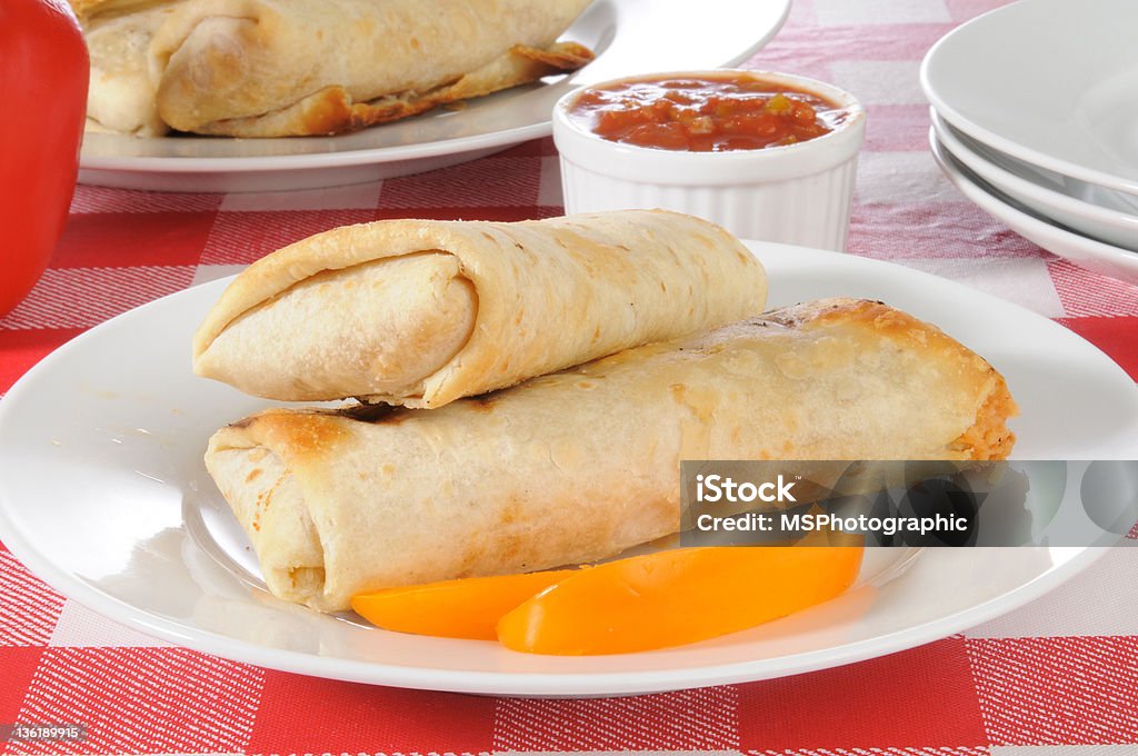 Plate of two burritos A plate with two burritos or chimichangas Chimichanga Stock Photo