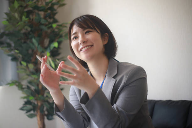 istock Smile female employee 1361899914