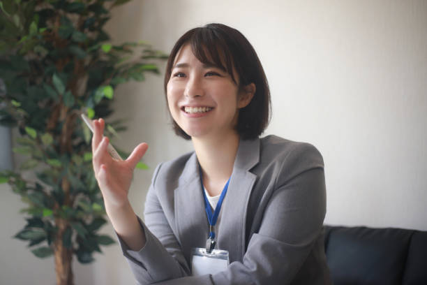 istock Smile female employee 1361900728