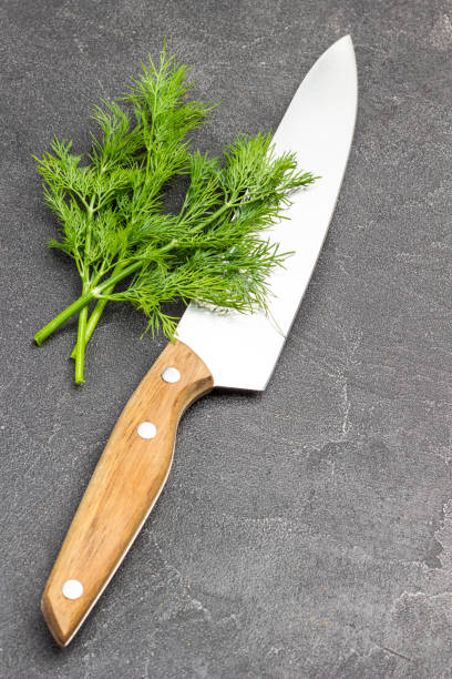 istock Knife and sprig of dill. 1361901765