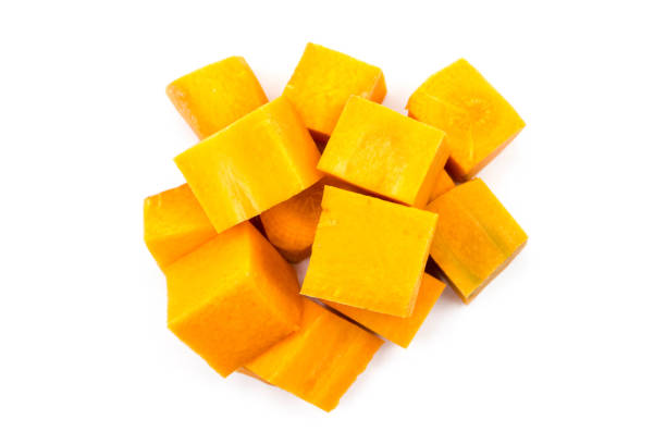 istock Carrot cubes isolated on white background top view 1361902856