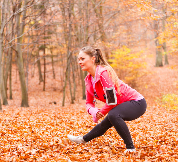istock Fit girl doing stretching outdoor. 1361904232