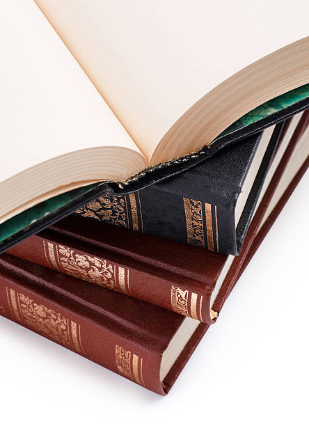 istock open book with blank pages on a pile of books 136190429