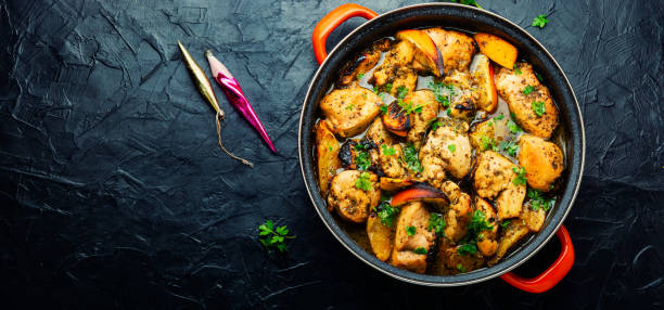 istock Pieces of chicken fillet in oranges, copy space 1361905196