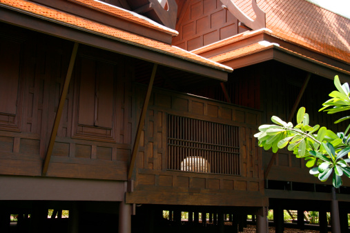 A Traditional Thai house, made from teak wood. Hard to find that kind of roof, style nowadays.