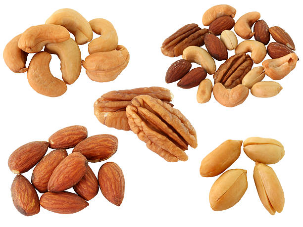 istock Assortment of Roasted Nuts:Cachew,peanut,almond isolated on white 136191148