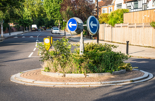 A small roundabout on a residential street in London.
