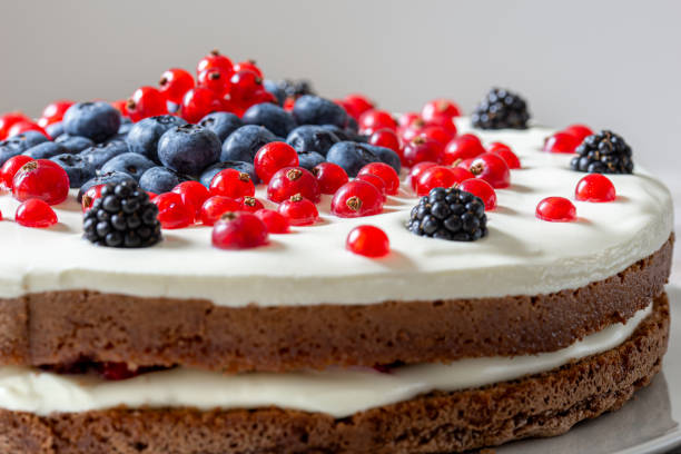 berry layer cake with chocolate and cream