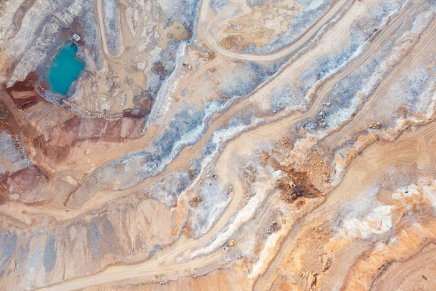 istock Sand quarry from a great height, beautiful orange patterns on the rocks 1361915023