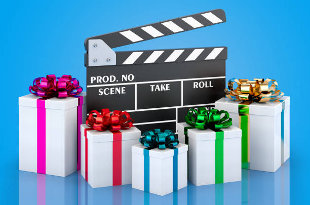 istock Movie clapper with presents, 3D rendering 1361915203