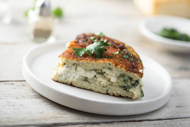 istock Traditional homemade frittata with herbs and cheese 1361917410
