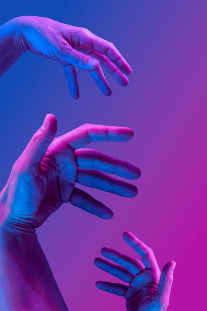 istock Hands in a surreal style in violet blue neon colors. Modern psychedelic creative element with human palm for posters, banners, wallpaper. Copy space for text. Magazine style template. Pop art culture. 1361922038