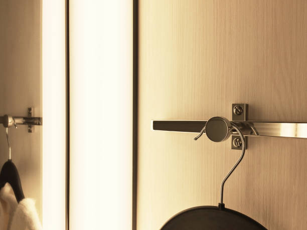 istock Coat hanger hanging in the clothing room 1361925479