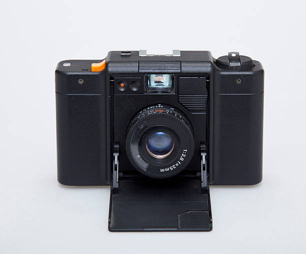 isolated old vintage 35mm camera stock photo