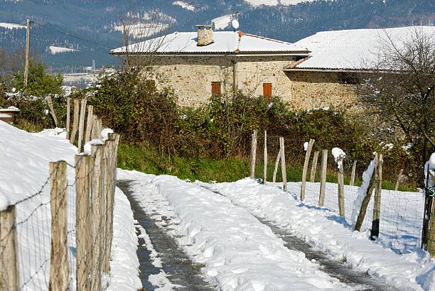 Rural neighborhood in winter Rural neighborhood in winter, covered with snow. Near the town of Durango, in the Basque Country (Spain). alambrada stock pictures, royalty-free photos & images