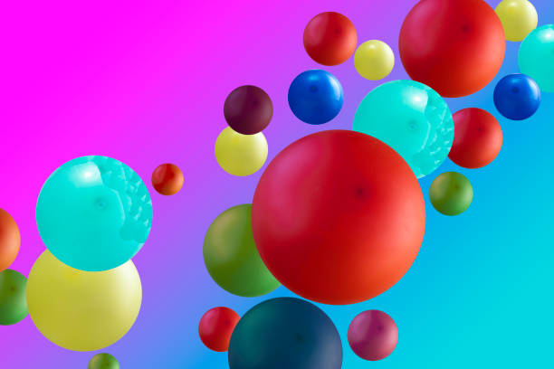 istock Creative image of colorful balloons floating in the studio. Abstract multicolored spheres on blue and pink backgrounds. 1361926679
