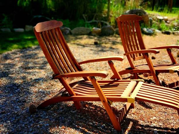istock Orange Stained Wooden Chairs in Nature 1361927770