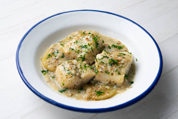istock Cod in green sauce with potatoes. Traditional northern Spanish tapa 1361929649