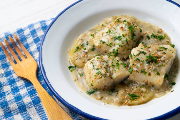 istock Cod in green sauce with potatoes. Traditional northern Spanish tapa 1361929651