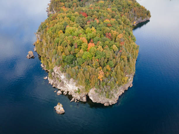 Lone Rock Point on Lake Champlain, Vermont in the Fall Fall Colors at Lone Rock Point on Lake Champlain in Burlington, Vermont. green mountains appalachians photos stock pictures, royalty-free photos & images