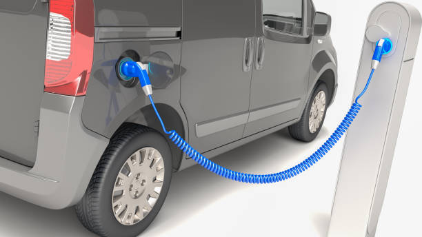 istock Electric minivan at charging station gray 1361932424