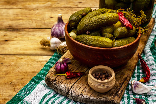 istock Marinated pickled cucumbers with spices and herbs 1361935243