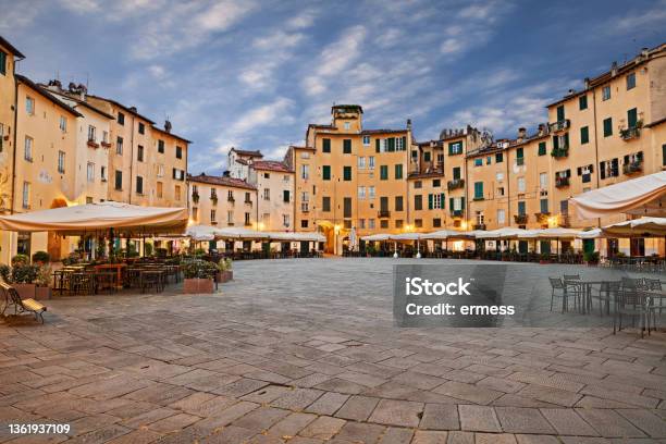 Lucca Tuscany Italy The Ancient Elliptical Amphitheater Square With Outdoor Bars And Restaurants In The Old Town Of The Medieval City Stock Photo - Download Image Now