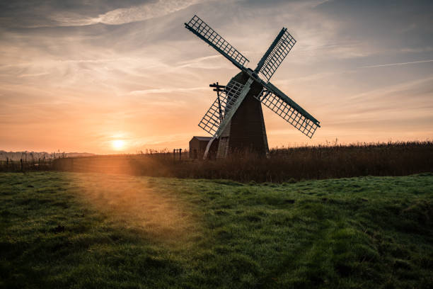 istock Herringfleet haze. Sunrise behind Herringfleet Mill 1361938316