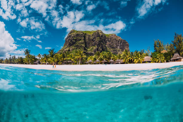 istock Tropical ocean with Le Morne mountain and sandy beach in Mauritius. Split view. 1361939219