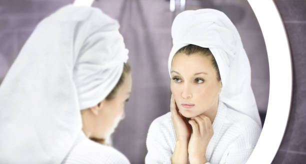 istock Magic anti-aging cream.Applying the cream. 1361941532
