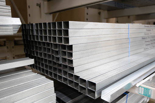 Stack of galvanized rectangular steel pipes for building materials. Production and construction of drywall walls. the concept of the construction. High quality photo
