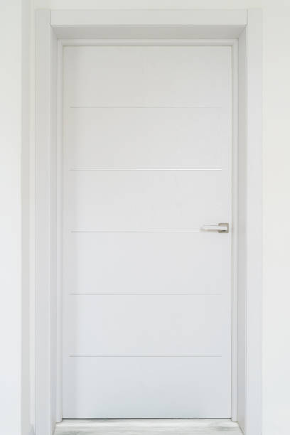 istock White closed door close up 1361952479