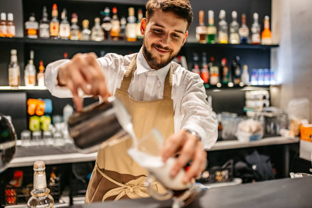 istock Bartender making Frappuccino with whipped cream 1361952655