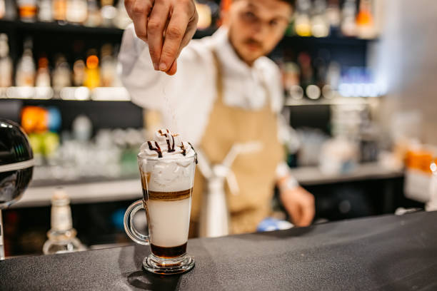 istock Bartender making Frappuccino with whipped cream 1361952725