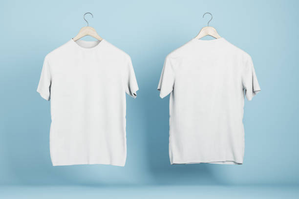 istock Empty white t-shirts on blue wall background, Product design and presentation concept. Mock up logo. 3D Rendering. 1361953556