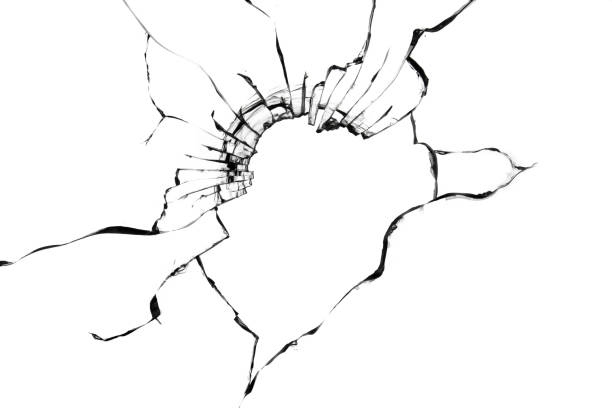 istock Texture of broken glass on a white background. Black cracks of a broken window. 1361953564