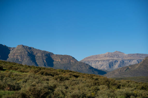 Marakele National Park safari game drive in Limpopo province, South Africa, with amazing scenic views of mountains, savanna, and wildlife habitat. The landscape combines rugged peaks, open grasslands, and natural wilderness, showcasing the beauty of African safari adventures.