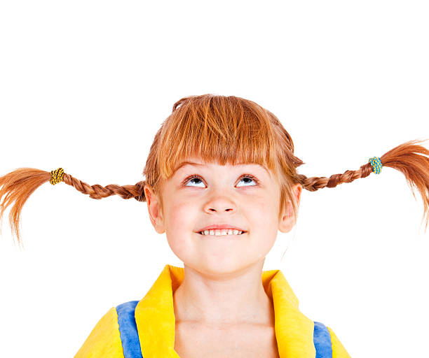 Girl looking up Portrait of a funny red haired girl looking up little redhead girl stock pictures, royalty-free photos & images