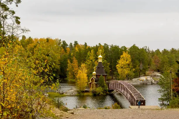 Melnikovskoe rural settlement, Vuoksa river, Leningrad region, Priozersky district, Russia. October 1, 2021. The Church of St. Andrew the First-Called is the only church in the world that stands on a monolithic rock in the middle of the water, is included in the Guinness Book of Records.