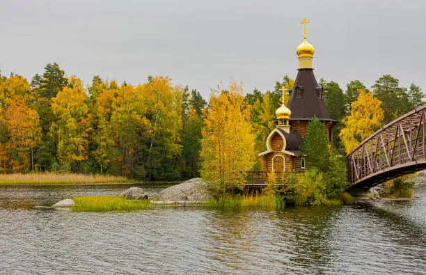 Melnikovskoe rural settlement, Vuoksa river, Leningrad region, Priozersky district, Russia. October 1, 2021. The Church of St. Andrew the First-Called is the only church in the world that stands on a monolithic rock in the middle of the water, is included in the Guinness Book of Records.