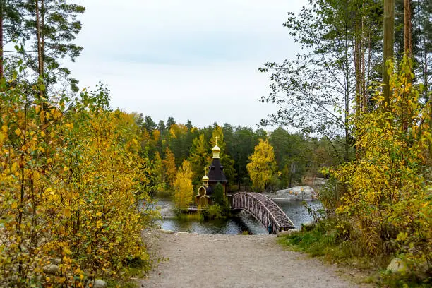 Melnikovskoe rural settlement, Vuoksa river, Leningrad region, Priozersky district, Russia. October 1, 2021. The Church of St. Andrew the First-Called is the only church in the world that stands on a monolithic rock in the middle of the water, is included in the Guinness Book of Records.