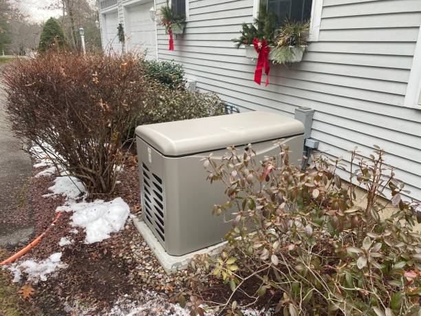 Standby residential generator Standby residential generator on concrete pad generator stock pictures, royalty-free photos & images