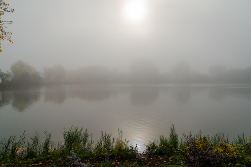 Foggy morning by the river, St. Lawrence river, in LaSalle, Quebec