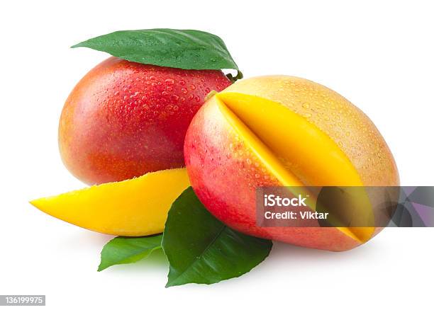 Mango Foto de stock y más banco de imágenes de Alimento - Alimento, Amarillo - Color, Corte transversal