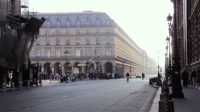 Early Morning on a Street near the Louvre Museum in Paris, France. 4K Resolution.